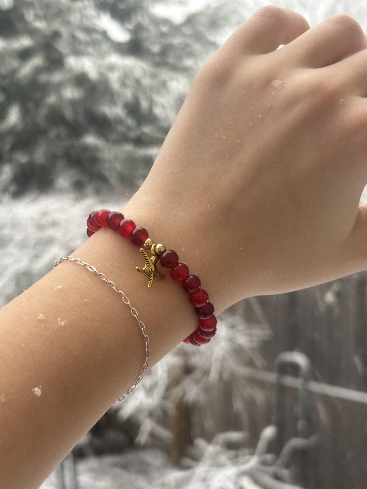 Red beaded S.A.V bracelet with star charm
